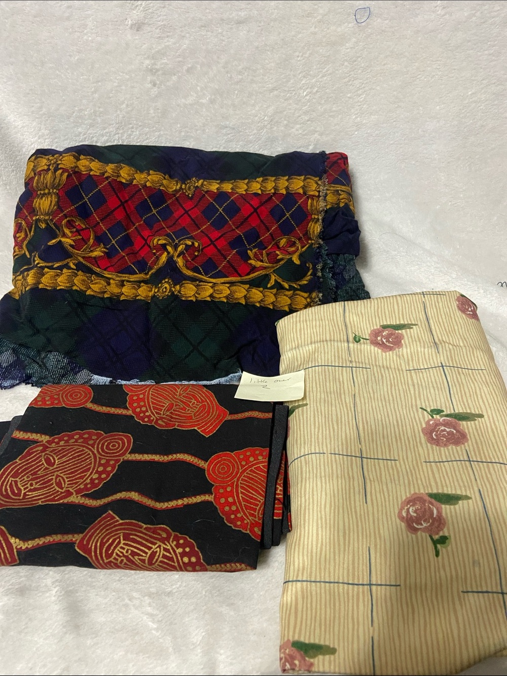 Around 2 pounds of Assorted scrap Fabrics for Crafting and Diys.